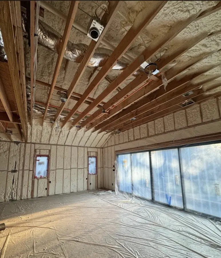 Interior walls and ceiling insulated with spray foam during new construction in West Fargo